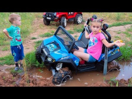 Melissa ride on children s car and stuck in the ground Arthur tows on the jeep Wrangler