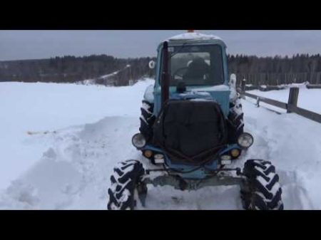 Заводим трактор МТЗ 82 месим снег